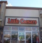 Store front for Little Caesar's Pizza House