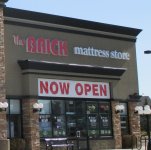 Store front for The Brick Mattress Store